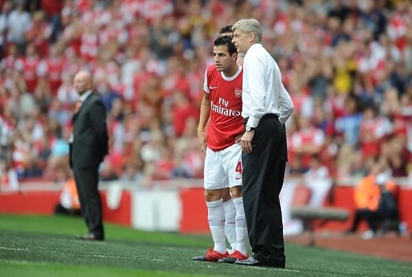 Arsenal manager Arsene Wenger with substitute Cesc Fabregas. Arsenal 6: 0 Blackpool