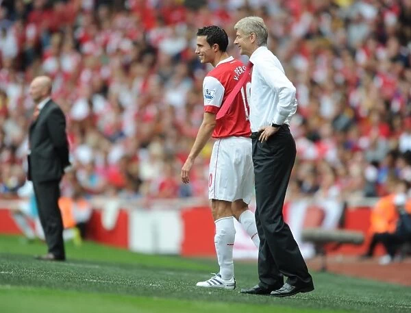 Arsenal manager Arsene Wenger with substitute Robin van Persie. Arsenal 6: 0 Blackpool
