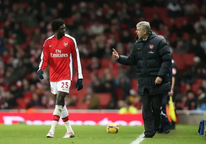 Framed Print : Arsenal manager Arsene Wenger talks with Emmanuel Adebayor