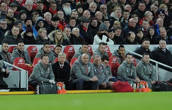 Arsenal Manager Arsene Wenger and Team Staff at Liverpool's Anfield during Premier League Match vs Arsenal (2016-17)