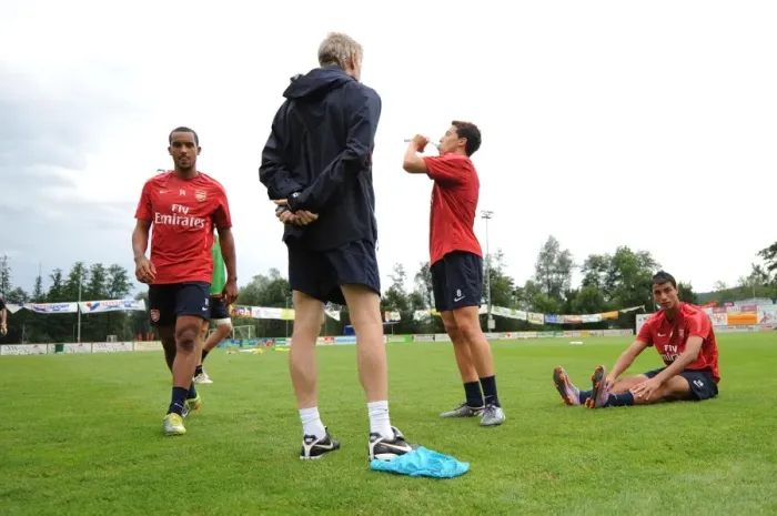 Framed Print : Arsenal manager Arsene Wenger with Theo Walcott and Samir Nasri. Arsenal Training Camp Framed Print : Arsenal manager Arsene Wenger with Theo Walcott and Samir Nasri. Arsenal Training Camp