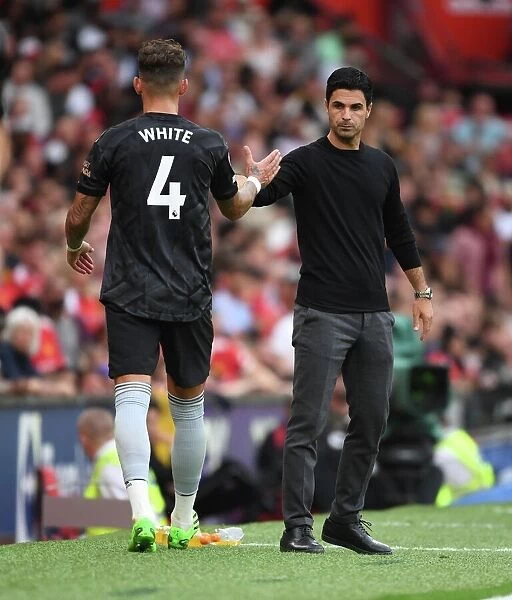 Arsenal Manager Mikel Arteta with Ben White at Manchester United vs Arsenal, 2022-23 Premier League