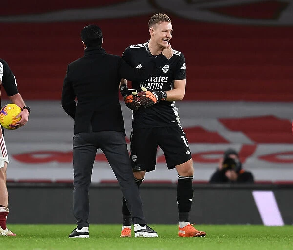 Arsenal Manager Mikel Arteta and Bernd Leno Celebrate Victory Over Chelsea in Empty Emirates Stadium, 2020-21 Premier League
