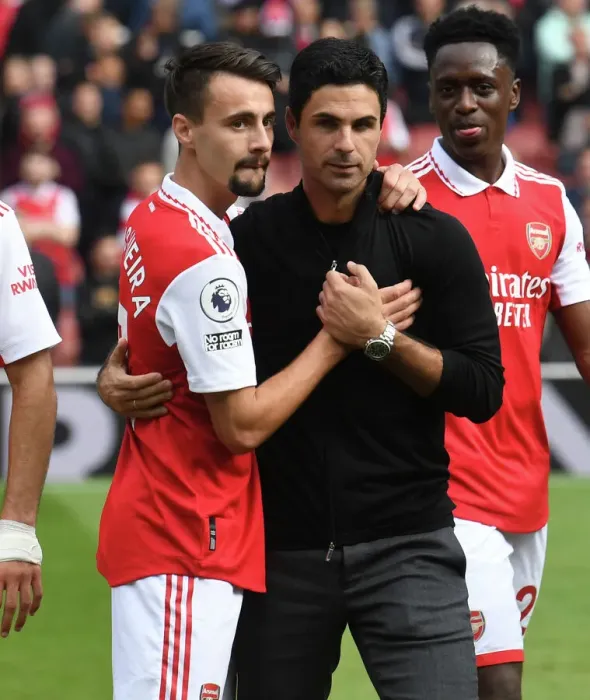 Framed Print : Arsenal Manager Mikel Arteta Celebrates with Fabio Vieira After Arsenal's Victory Against Tottenham Hotspur (2022-23)