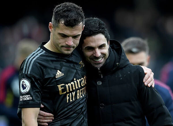 Arsenal Manager Mikel Arteta Celebrates with Granit Xhaka after Fulham Victory, 2022-23 Premier League