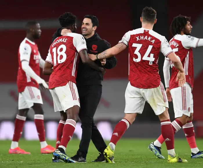 Framed Print : Arsenal Manager Mikel Arteta Celebrates with Thomas Partey and Granit Xhaka after Arsenal's Victory over Tottenham Hotspur (2020-21) Framed Print : Arsenal Manager Mikel Arteta Celebrates with Thomas Partey and Granit Xhaka after Arsenal's Victory over Tottenham Hotspur (2020-21)