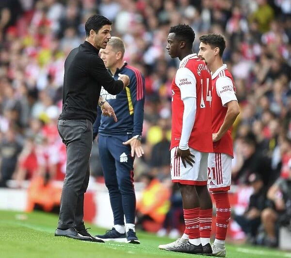 Arsenal Manager Mikel Arteta Conferencing with Substitutes During Arsenal v Tottenham Premier League Clash (2022-23)
