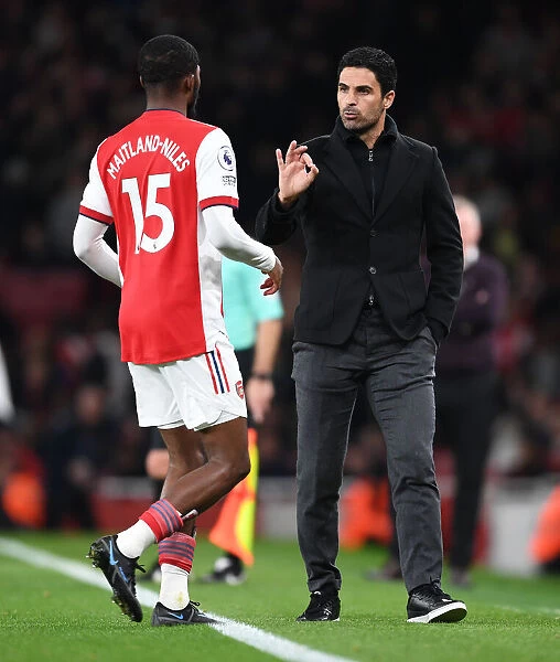 Arsenal Manager Mikel Arteta Conferencing with Ainsley Maitland-Niles during Arsenal vs Aston Villa (2021-22)