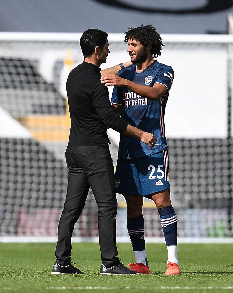 Arsenal Manager Mikel Arteta Consults with Mo Elneny Amidst Fulham Showdown