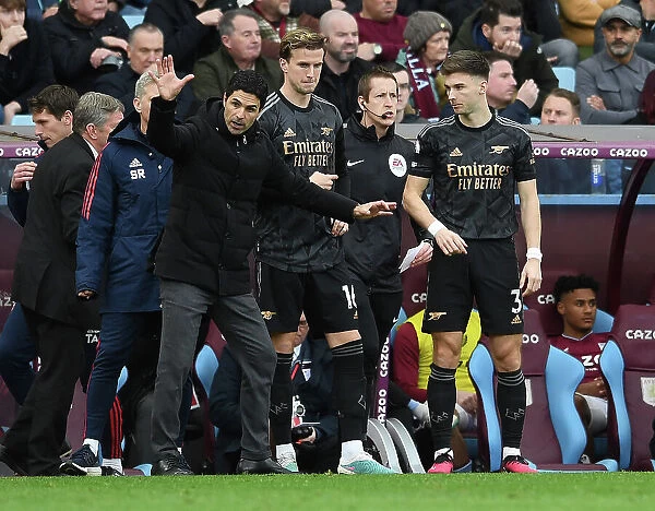 Arsenal Manager Mikel Arteta Gives Instructions to Substitutes Holding and Tierney during Aston Villa vs Arsenal (2022-23)