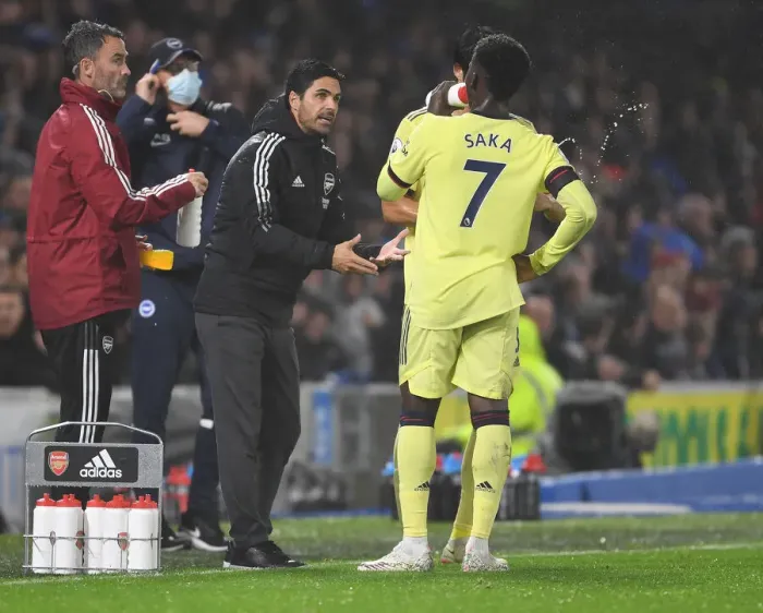 Framed Print : Arsenal Manager Mikel Arteta Guides Bukayo Saka at Brighton & Hove Albion Match, 2021-22 Premier League Framed Print : Arsenal Manager Mikel Arteta Guides Bukayo Saka at Brighton & Hove Albion Match, 2021-22 Premier League
