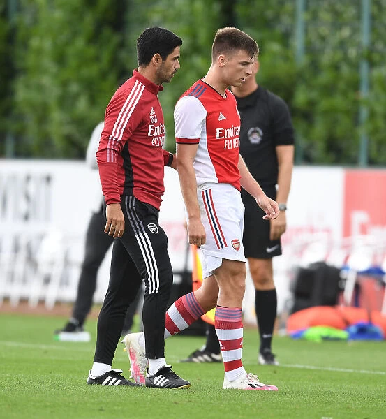 Arsenal Manager Mikel Arteta Guides Kieran Tierney during Pre-Season Training