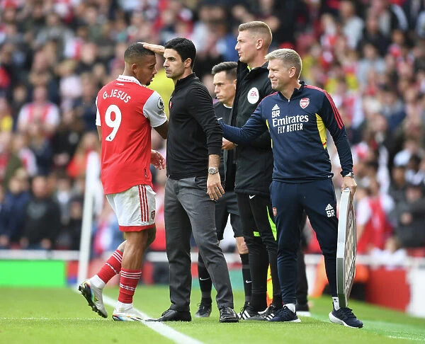 Arsenal Manager Mikel Arteta with Steve Round and Gabriel Jesus: Pre-Match Huddle vs. Tottenham Hotspur (2022-23)