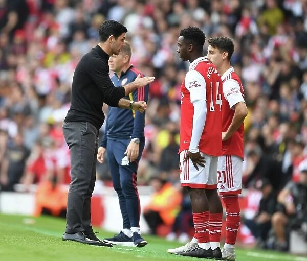 Arsenal Manager Mikel Arteta Strategizes with Subs During Arsenal v Tottenham Premier League Clash (2022-23)