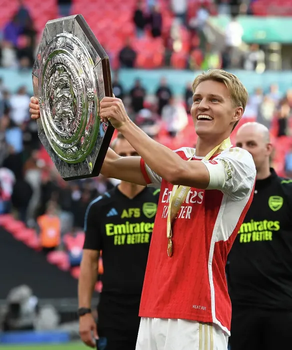 Framed Print : Arsenal: Martin Odegaard Lifts the Community Shield (2023-24) Framed Print : Arsenal: Martin Odegaard Lifts the Community Shield (2023-24)