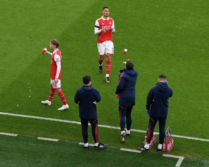 Framed Print : Arsenal: Martin Odegaard and William Saliba Share a Moment Before Arsenal v Brentford (2022-23)