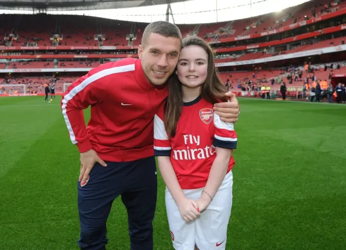Framed Print : Arsenal mascot with Lukas Podolski (Arsenal). Arsenal 2: 0 Fulham. Barclays Premier League