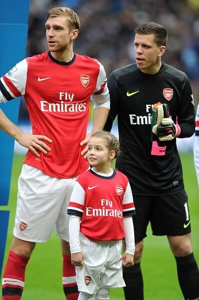 Arsenal Mascot with Per Mertesacker (Arsenal). Manchester City 6: 3 Arsenal. Barclays Premier League