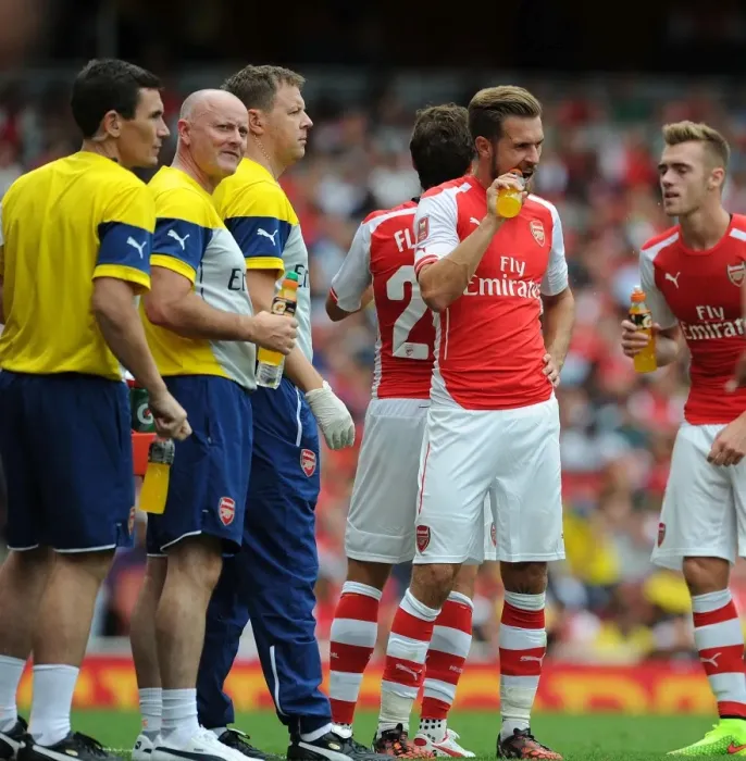 Framed Print : Arsenal Medical Team Tending to Calum Chambers and Aaron Ramsey during Arsenal v Benfica, Emirates Cup 2014-15