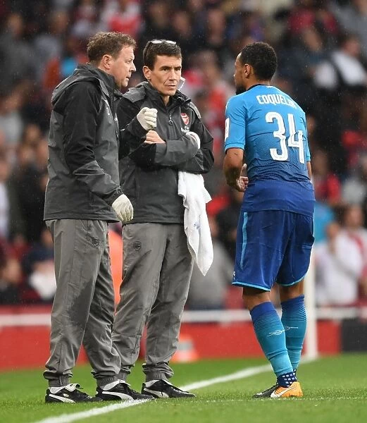 Arsenal Medical Team Tends to Francis Coquelin During Emirates Cup Match against SL Benfica