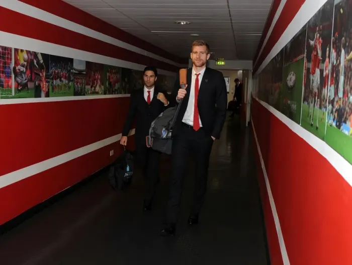 Framed Print : Arsenal: Mertesacker and Arteta Head to Emirates Stadium for Champions League Clash against Marseille Framed Print : Arsenal: Mertesacker and Arteta Head to Emirates Stadium for Champions League Clash against Marseille