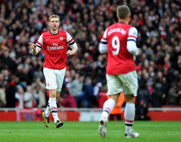 Arsenal: Per Mertesacker Consoles Lukas Podolski Amidst Rivalry - Arsenal v Tottenham Hotspur, 2012-13