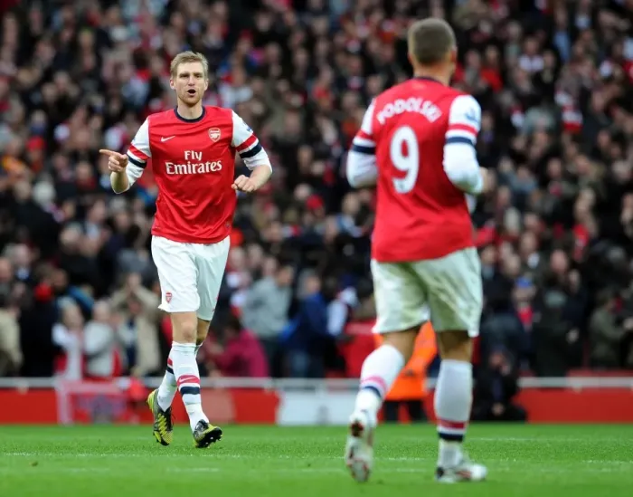 Framed Print : Arsenal: Per Mertesacker Consoles Lukas Podolski Amidst Rivalry - Arsenal v Tottenham Hotspur, 2012-13 Framed Print : Arsenal: Per Mertesacker Consoles Lukas Podolski Amidst Rivalry - Arsenal v Tottenham Hotspur, 2012-13