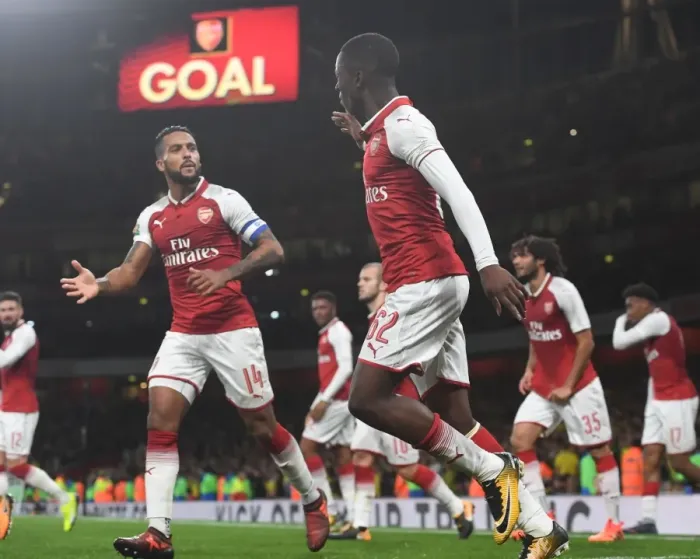 Framed Print : Arsenal: Nketiah and Walcott Celebrate Goal Against Norwich City in Carabao Cup Framed Print : Arsenal: Nketiah and Walcott Celebrate Goal Against Norwich City in Carabao Cup