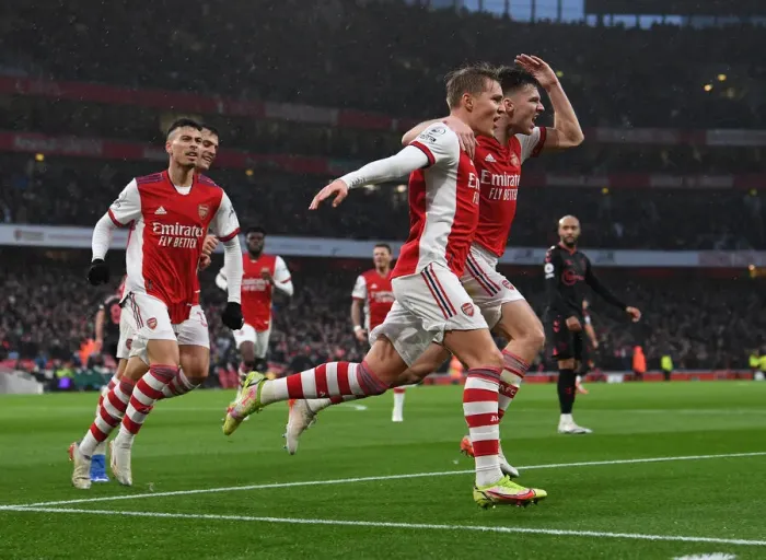 Framed Print : Arsenal: Odegaard and Tierney's Celebration of a Goal Against Southampton (Premier League 2021-22)