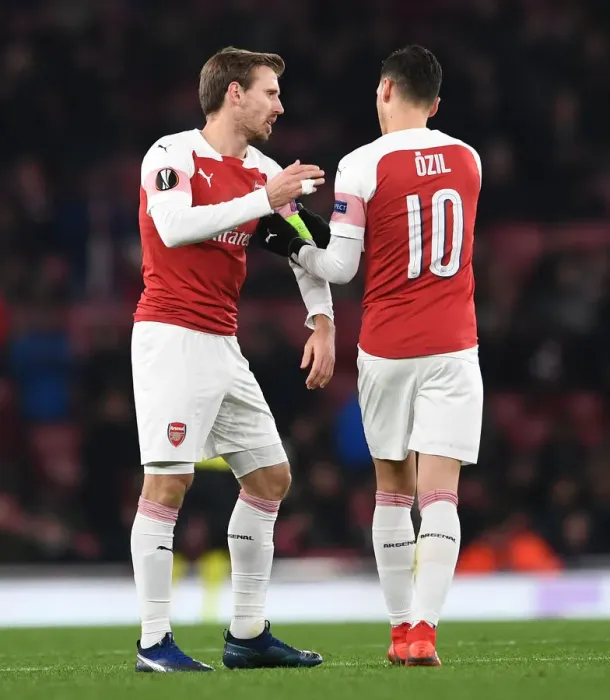 Framed Print : Arsenal: Ozil Passes the Captain's Armband to Monreal vs Qarabag, Europa League 2018-19