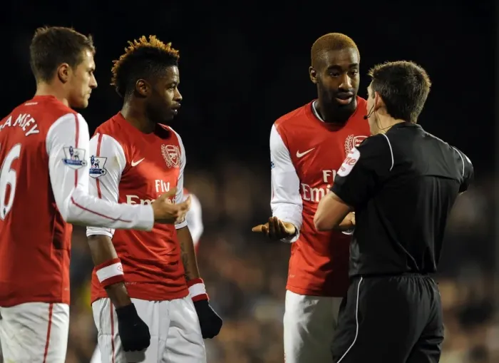Framed Print : Arsenal Players Aaron Ramsey, Alex Song, and Johan Djourou Discuss with Referee Lee Probert during Fulham vs Arsenal Premier League Match Framed Print : Arsenal Players Aaron Ramsey, Alex Song, and Johan Djourou Discuss with Referee Lee Probert during Fulham vs Arsenal Premier League Match