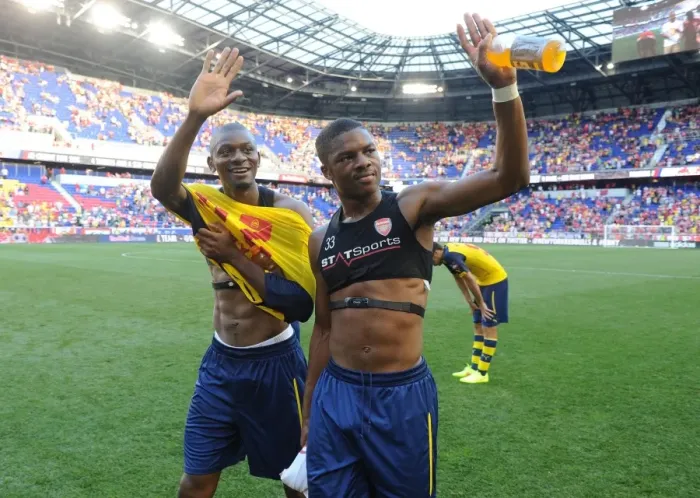 Framed Print : Arsenal Players Abou Diaby and Chuba Akpom Wave to Fans after New York Red Bulls Pre-Season Match Framed Print : Arsenal Players Abou Diaby and Chuba Akpom Wave to Fans after New York Red Bulls Pre-Season Match