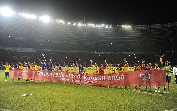 Arsenal Players Show Appreciation to Indonesian Fans with Banner Post-Match, 2013