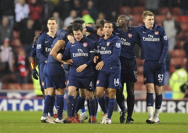 Arsenal players celebrate after the match. Stoke City 1:3 Arsenal, Barclays Premier League