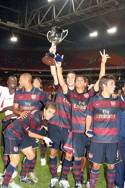 The Arsenal players celebrate winning the Amsterdam tournament