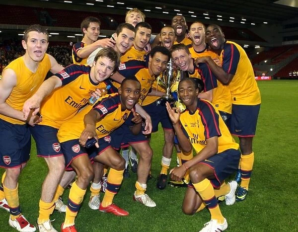 The Arsenal players celebrate winning the FA Youth Cup