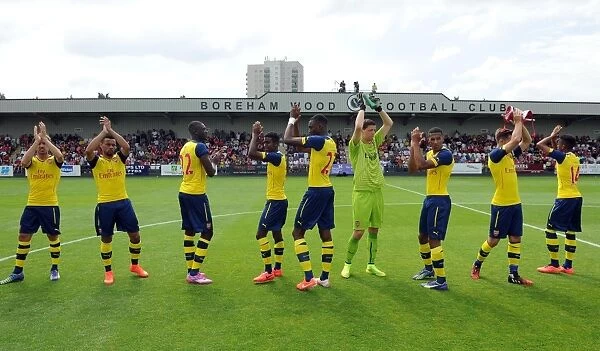 The Arsenal players clap the fans before the match. Boreham Wood 0: 2 Arsenal. Pre Season Friendly