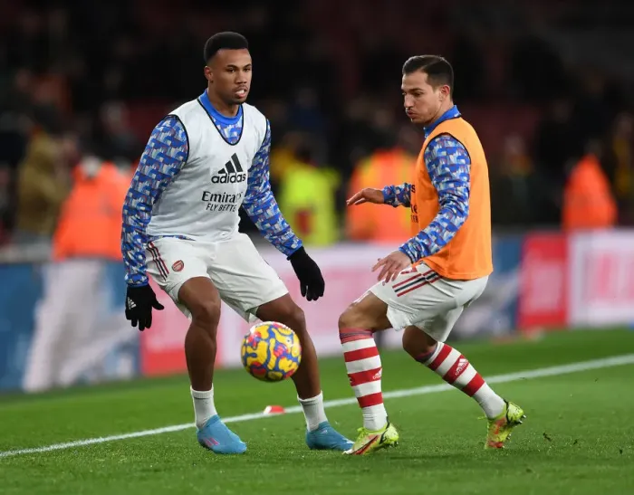 Framed Print : Arsenal Players Gabriel Magalhaes and Cedric Soares Warm Up Ahead of Arsenal v Wolverhampton Wanderers, Premier League 2021-22