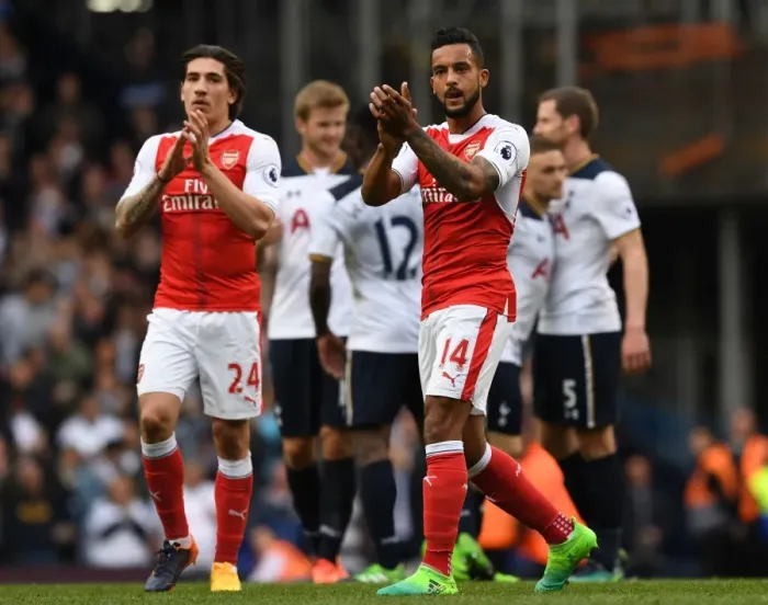 Framed Print : Arsenal Players Hector Bellerin and Theo Walcott Celebrate with Fans after Tottenham Victory Framed Print : Arsenal Players Hector Bellerin and Theo Walcott Celebrate with Fans after Tottenham Victory