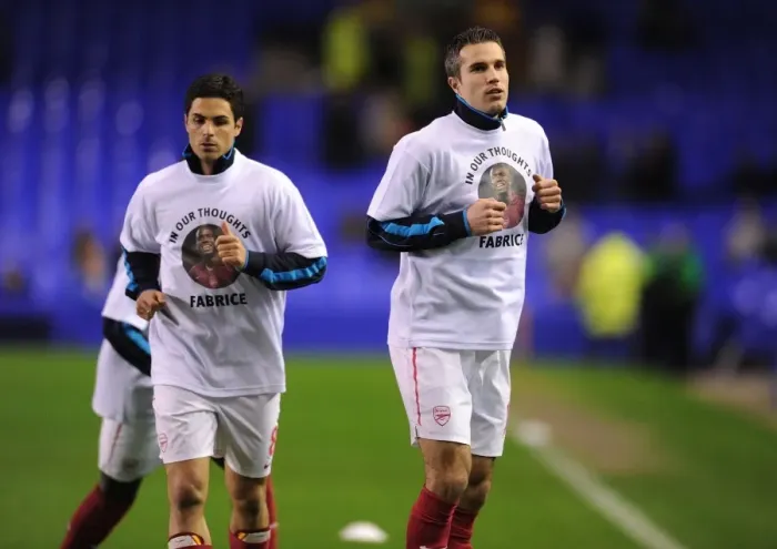 Framed Print : Arsenal Players Honor Fabrice Muamba with Emotional Tribute During Warm-Up Before Everton Clash (2012)