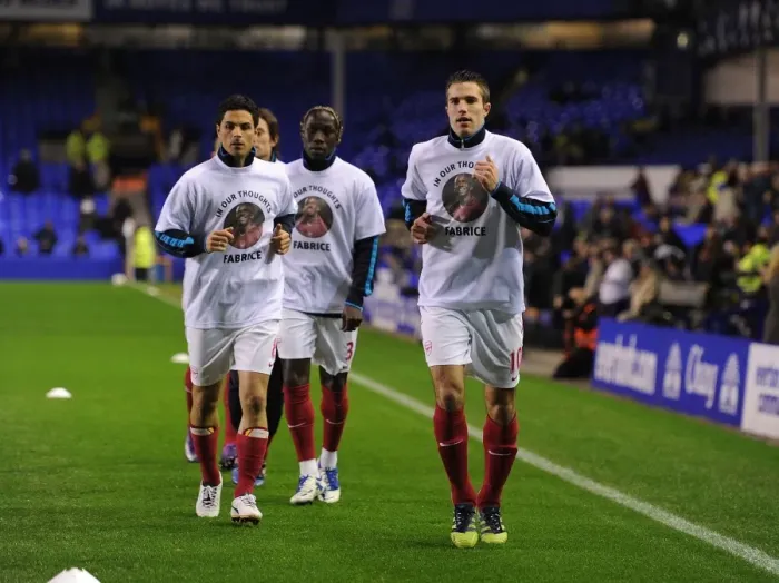 Framed Print : Arsenal Players Honor Fabrice Muamba with Tribute T-Shirts before Everton Match (2012) Framed Print : Arsenal Players Honor Fabrice Muamba with Tribute T-Shirts before Everton Match (2012)