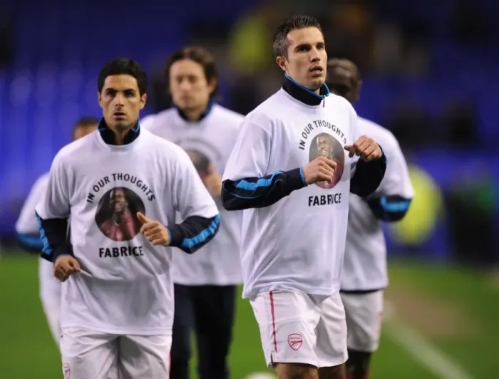 Framed Print : Arsenal Players Honor Fabrice Muamba with Warm-Up Tribute Ahead of Everton Clash (2012) Framed Print : Arsenal Players Honor Fabrice Muamba with Warm-Up Tribute Ahead of Everton Clash (2012)