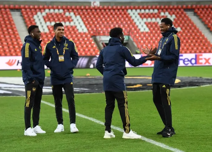 Framed Print : Arsenal Players Inspect Europa League Pitch at Standard Liege Ahead of Showdown