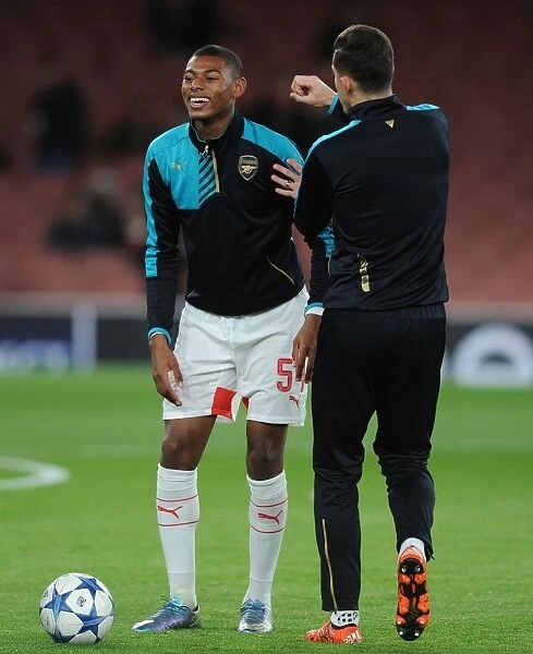 Arsenal Players Jeff Reine-Adelaide and Gabriel: A Light-Hearted Moment During Arsenal v Dinamo Zagreb Warm-Up, UEFA Champions League, 2015