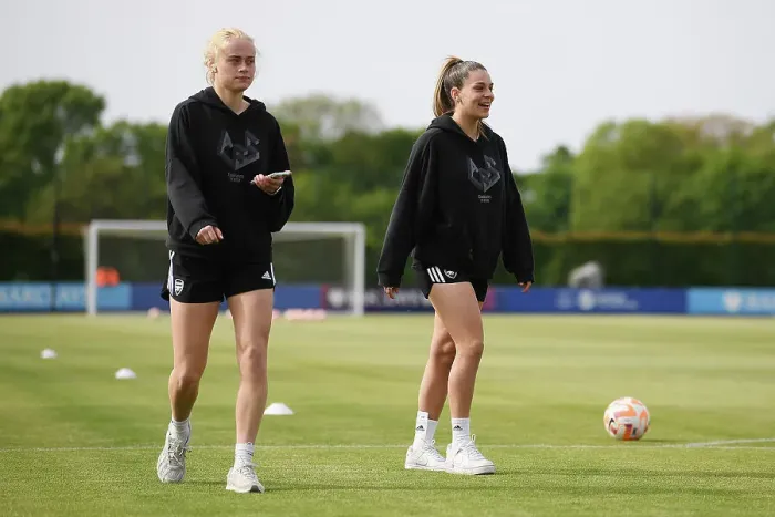 Framed Print : Arsenal Players Kathrine Kuhl and Gio Queiroz Inspecting the Pitch Before Everton vs Arsenal Women's Super League Match Framed Print : Arsenal Players Kathrine Kuhl and Gio Queiroz Inspecting the Pitch Before Everton vs Arsenal Women's Super League Match