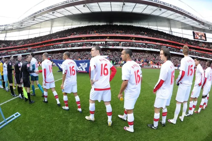 Framed Print : Arsenal players line up before the match wearing Aaron Ramsey shirts. Arsenal 3: 1 Burnley Framed Print : Arsenal players line up before the match wearing Aaron Ramsey shirts. Arsenal 3: 1 Burnley