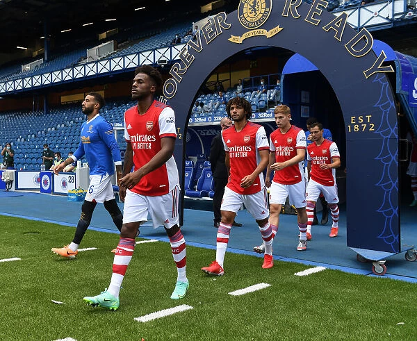 Arsenal Players Make Their Way Out Before Rangers Friendly: Pre-Season Encounter at Ibrox Stadium