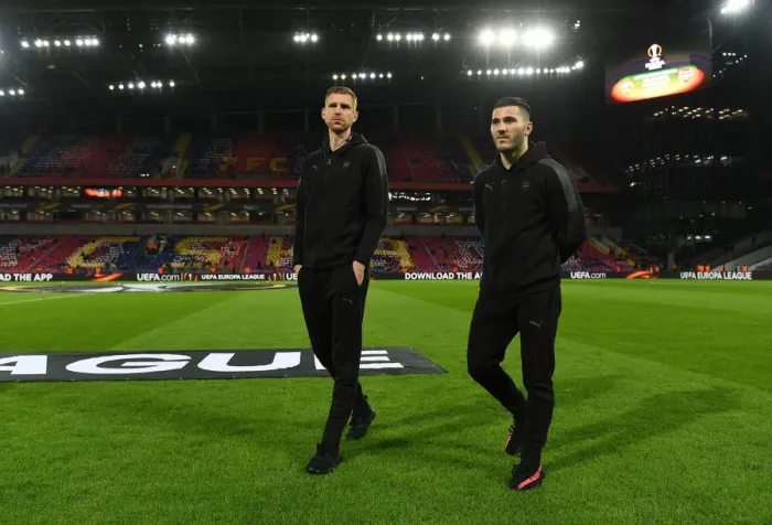 Framed Print : Arsenal Players Per Mertesacker and Sead Kolasinac Scout CSKA Moscow Pitch before Europa League Quarterfinal Framed Print : Arsenal Players Per Mertesacker and Sead Kolasinac Scout CSKA Moscow Pitch before Europa League Quarterfinal