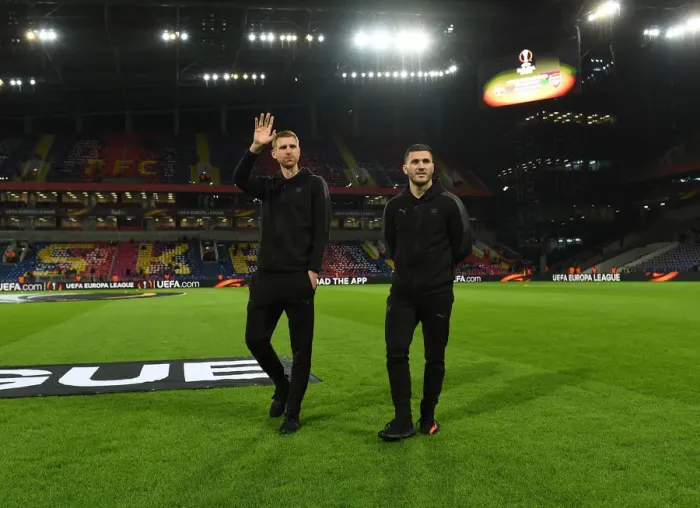 Framed Print : Arsenal Players Per Mertesacker and Sead Kolasinac Scouting the Pitch before CSKA Moskva vs Arsenal UEFA Europa League Quarterfinal