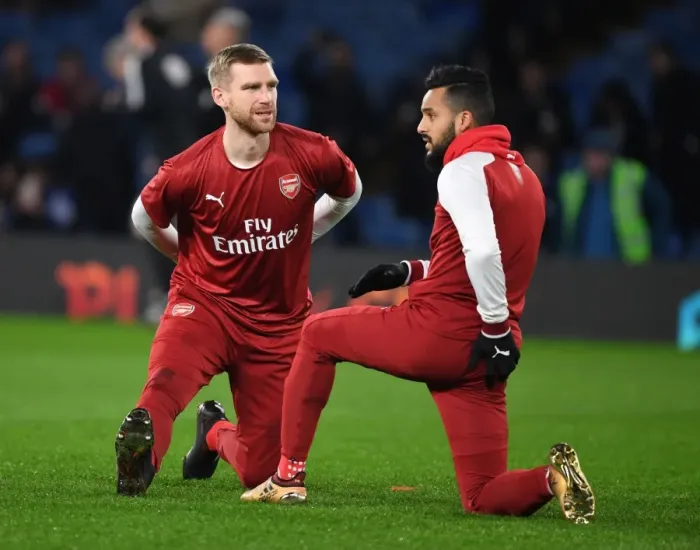 Framed Print : Arsenal Players Per Mertesacker and Theo Walcott Before Carabao Cup Semi-Final vs Chelsea Framed Print : Arsenal Players Per Mertesacker and Theo Walcott Before Carabao Cup Semi-Final vs Chelsea